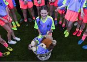 27 October 2017; Ellen Ni Dhrisceoil of Scoil Bhride Raghnallach puts her teddy bear in the Sam Maguire cup, during day 3 of the Allianz Cumann na mBunscol Finals at Croke Park, in Dublin. Photo by David Fitzgerald/Sportsfile