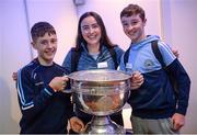 28 October 2017; Oisín Magone, age 14, from left, Sarah Griffin, age 17, and Dan Griffin, age 14, from Mayobridge GAA Club, Co Down, hold up the Sam Maguire Cup in attendance at a #GAAyouth Forum 2017 at Croke Park in Dublin. Photo by Cody Glenn/Sportsfile