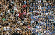 19 August 2012; Kilkenny supporters cheer their side's third goal as Tipperary supporters sit silently. GAA Hurling All-Ireland Senior Championship Semi-Final, Kilkenny v Tipperary, Croke Park, Dublin. Picture credit: Brendan Moran / SPORTSFILE
