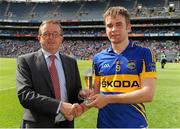 19 August 2012; John McGrath, Tipperary, who was presented with Electric Ireland Man of the Match award by Pat Naughton ESB Director Human Resources. Electric Ireland GAA Hurling All-Ireland Minor Championship Semi-Final, Tipperary v Galway, Croke Park, Dublin. Picture credit: Oliver McVeigh / SPORTSFILE