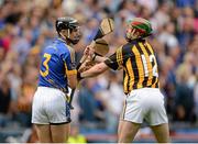19 August 2012; Paul Curran, Tipperary, and Eoin Larkin, Kilkenny, involved in a dispute during the first half. GAA Hurling All-Ireland Senior Championship Semi-Final, Tipperary v Kilkenny, Croke Park, Dublin. Picture credit: Oliver McVeigh / SPORTSFILE