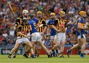 19 August 2012; Kilkenny and Tipperary players jostle with each other in the first 60 seconds of the game. GAA Hurling All-Ireland Senior Championship Semi-Final, Kilkenny v Tipperary, Croke Park, Dublin. Picture credit: Ray McManus / SPORTSFILE