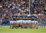 19 August 2012; The Tipperary team stand around John O'Brien, 14, during a minute's silence in memory of his brother Thomas, who died during the week. GAA Hurling All-Ireland Senior Championship Semi-Final, Kilkenny v Tipperary, Croke Park, Dublin. Picture credit: Dáire Brennan / SPORTSFILE
