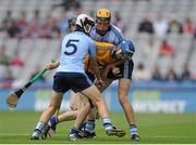 12 August 2012; Bobby Duggan, Clare, in action against Eoghan O'Donnell, 5, and Paul Winters, Dublin. Electric Ireland GAA Hurling All-Ireland Minor Championship Semi-Final, Clare v Dublin, Croke Park, Dublin. Picture credit: Pat Murphy / SPORTSFILE
