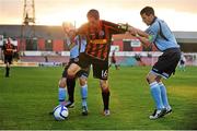 20 August 2012; Dwayne Wilson, Bohemians, in action against Lorcan Fitzgerald, left, and Brian Shorthall, Shelbourne. Airtricity League Premier Division, Bohemians v Shelbourne, Dalymount Park, Dublin. Picture credit: Barry Cregg / SPORTSFILE