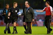 20 August 2012; Bohemians manager Aaron Callaghan, right, argues with referee Alan Kelly as he is escorted off the pitch at half-time. Airtricity League Premier Division, Bohemians v Shelbourne, Dalymount Park, Dublin. Picture credit: Barry Cregg / SPORTSFILE