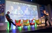 28 October 2017; Christopher Larkin, age 15, representing Éire Óg, Co Armagh, kicks the gaelic football to Rory O'Connor, from Rory's Stories, during the #GAAyouth Forum 2017 at Croke Park in Dublin. Photo by Cody Glenn/Sportsfile
