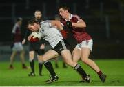 28 October 2017; Hugh Gallagher of Omagh St Enda's in action against Shane McGuigan of Slaughtneil during the AIB Ulster GAA Football Senior Club Championship Quarter-Final match between Slaughtneil and Omagh St Enda's at Celtic Park in Derry. Photo by Oliver McVeigh/Sportsfile