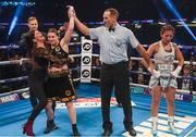 28 October 2017; Referee Steve Gray raises Katie Taylor's hand in victory, as she is congratulated by her mother Bridget Taylor, following her vacant WBA World Female Lightweight Title bout with Anahi Sanchez at the Principality Stadium in Cardiff, Wales. Photo by Stephen McCarthy/Sportsfile