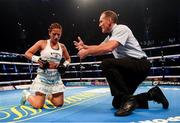 28 October 2017; Anahi Sanchez receives a count from referee Steve Gray during her vacant WBA World Female Lightweight Title bout with Katie Taylor at the Principality Stadium in Cardiff, Wales. Photo by Stephen McCarthy/Sportsfile