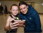 29 October 2017; Newly crowned WBA Female World Lightweight Champion Katie Taylor is greeted by Jenna Dunphy, age 11, from Waterford City, on her arrival at Dublin Airport. Taylor defeated Argentinian Anahi Sanchez for the vacant belt at the Principality Stadium in Cardiff, Wales, on Saturday October 28. Photo by Stephen McCarthy/Sportsfile