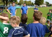23 August 2012; Leinster players Brian O'Driscoll, left, and Cian Healy, speaking with pariticipants during the VW Leinster Rugby Summer Camps at Clontarf RFC. Clontarf RFC, Castle Avenue, Clontarf, Dublin. Picture credit: Brian Lawless / SPORTSFILE