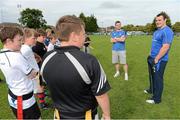 23 August 2012; Leinster players Cian Healy, right, and Brian O'Driscoll, speaking to participants during the VW Leinster Rugby Summer Camps at Clontarf RFC. Clontarf RFC, Castle Avenue, Clontarf, Dublin. Picture credit: Brian Lawless / SPORTSFILE