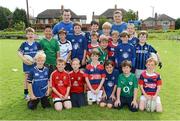 23 August 2012; Leinster players Cian Healy and Brian O'Driscoll with participants during the VW Leinster Rugby Summer Camps at Clontarf RFC. Clontarf RFC, Castle Avenue, Clontarf, Dublin. Picture credit: Brian Lawless / SPORTSFILE