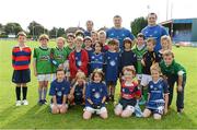 23 August 2012; Leinster players Cian Healy and Brian O'Driscoll with participants during the VW Leinster Rugby Summer Camps at Clontarf RFC. Clontarf RFC, Castle Avenue, Clontarf, Dublin. Picture credit: Brian Lawless / SPORTSFILE