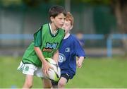 23 August 2012; Simon Barrett, age 9, from Dublin, in action during the VW Leinster Rugby Summer Camps at Clontarf RFC. Clontarf RFC, Castle Avenue, Clontarf, Dublin. Picture credit: Brian Lawless / SPORTSFILE
