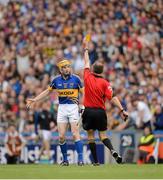 19 August 2012; Lar Corbett, Tipperary, is shown a yellow card by referee Cathal McAllister early in the second half. GAA Hurling All-Ireland Senior Championship Semi-Final, Kilkenny v Tipperary, Croke Park, Dublin. Picture credit: Ray McManus / SPORTSFILE