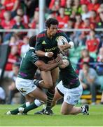 24 August 2012; Casey Laulala, Munster, is tackled by Joe Ansbro, left, and Max Lahiff, London Irish. Pre-Season Friendly, Munster v London Irish, Musgrave Park, Cork. Picture credit: Diarmuid Greene / SPORTSFILE