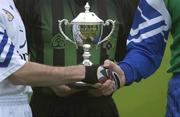 30 October 2002; Team captains John Keane, left, of the Garda Siochana team and Damian Tucker, of the PSNI team, shake hands in front of referee Senan Finucane, before a representative Gaelic Football match between An Garda Siochana and the Police Service of Northern Ireland at the Westmanstown Sports Centre, Westmanstown, Co. Dublin. Picture credit; Brendan Moran / SPORTSFILE *EDI*