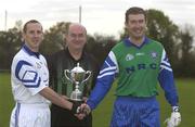 30 October 2002; Referee Senan Finucane pictured with John Keane, left, Garda Siochana team captain and Damian Tucker, PSNI team captain, before a representative Gaelic Football match between An Garda Siochana and the Police Service of Northern Ireland at the Westmanstown Sports Centre, Westmanstown, Co. Dublin. Picture credit; Brendan Moran / SPORTSFILE *EDI*