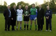 30 October 2002; George Kyne, Chairman of the Garda GAA club, left, Garda Commissioner Pat Byrne, 2nd left, John Keane, Garda Siochana team captain, Referee Senan Finucane, Damian Tucker, PSNI team captain,  Chief Constable of Northern Ireland, Hugh Orde, and Chief Supt Brian McCargo, Chairman of the PSNI GAA club, pictured before a representative Gaelic Football match between An Garda Siochana and the Police Service of Northern Ireland at the Westmanstown Sports Centre, Westmanstown, Co. Dublin. Picture credit; Brendan Moran / SPORTSFILE *EDI*