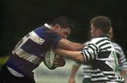 2 November 2002; The Old Cresent full-back Shane Stephens is tackled by Conor McNaughton, Greystones. Greystones v Old Crescent, AIB All Ireland League, Division 2, Dr. Hickey Park, Greystones, Co. Wicklow. Rugby. Picture credit; Pat Murphy / SPORTSFILE *EDI*