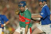 3 November 2002; John Leahy, Mullinahone, in action against Gerry Mernagh, Sarsfields. Thurles Sarsfields v CJ Kickhams Mullinahone, Tipperary County Senior Hurling Championship Final, Thurles, Co. Tipperary. Picture credit; Matt Browne / SPORTSFILE *EDI*