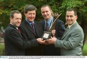 4 November 2002; Pictured at the announcement that AIB Bank are to treble their investment in the AIB GAA Club of the Year Awards scheme for the coming 12 months are, from left, Sean Kelly, President Elect of the GAA, Billy Finn, Managing Director, Ark Life, John Kearns and Turlough O'Brien, both Development Officers with Eire Og, winner of the Club of The Year Award 2001, at the AIB Bankcentre, Ballsbridge, Dublin. Hurling. Football. Picture credit; Ray McManus / SPORTSFILE