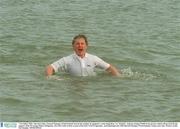 7 November 2002; Tim McCarthy, General Manager of Dell Ireland, braved the weather by going for a swim along Bray, Co. Wicklow, seafront raising Û5,000 in the process which will go towards the support of the 92 strong Chinese delegation, who will reside in Bray as part of the Host Town Programme,  participating in the 2003 Special Olympics World Summer Games next June. Picture credit; Pat Murphy / SPORTSFILE