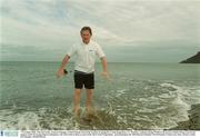 7 November 2002; Tim McCarthy, General Manager of Dell Ireland, braved the weather by going for a swim along Bray, Co. Wicklow, seafront raising Û5,000 in the process which will go towards the support of the 92 strong Chinese delegation, who will reside in Bray as part of the Host Town Programme,  participating in the 2003 Special Olympics World Summer Games next June. Picture credit; Pat Murphy / SPORTSFILE