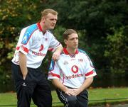 15 November 2002:  All Ireland Football champion and captain of Armagh, Kieran McGeeney and All Ireland hurling finalist for Clare, Brian Lohan, left, try the new Vodafone 2002 All Stars Jersey on for size. Both players are All Star Nominees but will have to wait a little longer to find out if they'll be wearing the jersey as part of the final 2002 All Stars Football and Hurling teams.  The Football All Stars team will be announced on Thursday, 28th November and the 2002 Hurling All Stars will be announced at the Vodafone GAA All Stars Banquet on November 29th at Citywest Hotel.  The Awards will be broadcast live on RTE. Picture credit; Brian Lawless / SPORTSFILE *EDI*