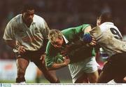 17 November 2002; Eric Miller, Ireland, in action against Jacob Rauluni (9), Fiji. Ireland v Fiji, International Rugby Friendly, Lansdowne Road, Dublin. Picture credit; Brendan Moran / SPORTSFILE