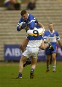 24 November 2002; James Conway, Ballinderry, is tackled by Errigal Ciaran's Peter Loughran. Errigal Ciaran v Ballinderry, Ulster Club Semi Final, St Tighearnachs Park, Clones, Co. Monaghan. Football. Picture credit; Damien Eagers / SPORTSFILE *EDI*