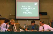 29 November 2002; John Delaney, left, FAI Treasurer, chats with Milo Corcoran, FAI president, also pictured is Kevin Fahy, Honorary Treasurer, and Michael Hyland, right, Chairman eircom League, before the start of the National Council Meeting, Ballymascanlon Hotel, Dundalk, Co. Louth. Soccer. Picture credit; David Maher / SPORTSFILE *EDI*