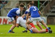 29 October 2017; Domhnail Nugent of Lamh Dhearg in action against Barry Fortune, Darragh Sexton and Niall Murray of Cavan Gaels during the AIB Ulster GAA Football Senior Club Championship Quarter-Final match between Cavan Gaels and Lamh Dhearg at Kingspan Breffni in Cavan. Photo by Oliver McVeigh/Sportsfile