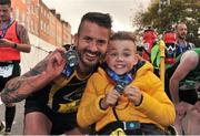 29 October 2017; Mark Lacey, left, and James Casserly, both from Lucan, after finishing the SSE Airtricity Dublin Marathon 2017 in Dublin City. 20,000 runners took to the Fitzwilliam Square start line to participate in the 38th running of the SSE Airtricity Dublin Marathon, making it the fifth largest marathon in Europe. Photo by Tomás Greally/Sportsfile