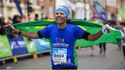 29 October 2017; Maria Adelaide Damio Batista De Oliveira represents Brazil as she finishes the SSE Airtricity Dublin Marathon 2017 in Dublin City. 20,000 runners took to the Fitzwilliam Square start line to participate in the 38th running of the SSE Airtricity Dublin Marathon, making it the fifth largest marathon in Europe. Photo by Cody Glenn/Sportsfile