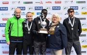 29 October 2017; Men's national medalists with race director Jim Aughney and Athletics Ireland President Georgina Drumm, from left, second placed Gary O'Hanlon, Clonliffe Harriers A.C, race winner Freddy Sittuk of Raheny Shamrock, and third placed Sergiu Ciobanu of Clonliffe Harriers, following the SSE Airtricity Dublin Marathon 2017 at Merrion Square in Dublin City. 20,000 runners took to the Fitzwilliam Square start line to participate in the 38th running of the SSE Airtricity Dublin Marathon, making it the fifth largest marathon in Europe. Photo by Ramsey Cardy/Sportsfile