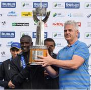 29 October 2017; Race winner Bernard Rotich of Kenya with the Noel Carroll Trophy following the SSE Airtricity Dublin Marathon 2017 at Merrion Square in Dublin City. 20,000 runners took to the Fitzwilliam Square start line to participate in the 38th running of the SSE Airtricity Dublin Marathon, making it the fifth largest marathon in Europe. Photo by Ramsey Cardy/Sportsfile