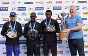 29 October 2017; On the podium after the men's race, are from left, second placed Yurii Ruskyuk of Ukraine, race winner Bernard Kotich of Kenya and third placed Asefa Legese Bekele following the SSE Airtricity Dublin Marathon 2017 at Merrion Square in Dublin City. 20,000 runners took to the Fitzwilliam Square start line to participate in the 38th running of the SSE Airtricity Dublin Marathon, making it the fifth largest marathon in Europe. Photo by Ramsey Cardy/Sportsfile