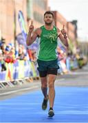 29 October 2017; Anthony Doyle, from Baldoyle, Dublin, crosses the finish line during the SSE Airtricity Dublin Marathon 2017 at Merrion Square in Dublin City. 20,000 runners took to the Fitzwilliam Square start line to participate in the 38th running of the SSE Airtricity Dublin Marathon, making it the fifth largest marathon in Europe. Photo by Sam Barnes/Sportsfile