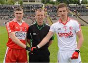30 June 2012; Referee Brendan Rice, centre, along with Derry captain Ciaran McFaul, left, and Tyrone captain Padraig Hampsey. Electric Ireland Ulster GAA Football Minor Championship Semi-Final, Derry v Tyrone, St Tiernach's Park, Clones, Co. Monaghan. Picture credit: Oliver McVeigh / SPORTSFILE