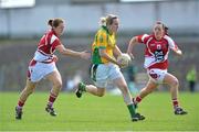 25 August 2012; Karen Guthrie, Donegal, in action against Ann Marie Walsh, left, and Aisling Barrett, right, Cork. TG4 All-Ireland Ladies Football Senior Championship Quarter-Final, Cork v Donegal, Dr. Hyde Park, Co. Roscommon. Picture credit: Barry Cregg / SPORTSFILE