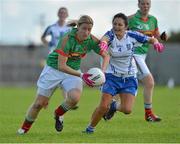 25 August 2012; Cora Staunton, Mayo, in action against Christina Reilly, Monaghan. TG4 All-Ireland Ladies Football Senior Championship Quarter-Final, Mayo v Monaghan, Dr. Hyde Park, Co. Roscommon. Picture credit: Barry Cregg / SPORTSFILE