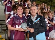 25 August 2012; Brian Enright, President of the Munster Ladies Gaelic Football Association, presents the player of the match award to Nicola Ward, Galway. All Ireland U16 ‘A’ Championship Final, Cork v Galway, MacDonagh Park, Nenagh, Co. Tipperary. Picture credit: Matt Browne / SPORTSFILE