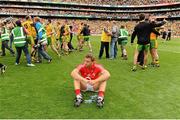 26 August 2012; A dejected Ciaran Sheehan, Cork, sitting on the field during the Donegal celebrations. GAA Football All-Ireland Senior Championship Semi-Final, Cork v Donegal, Croke Park, Dublin. Picture credit: Oliver McVeigh / SPORTSFILE