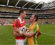 26 August 2012; Donegal's Karl Lacey is congratulated by Cork goalkeeper Alan Quirke after the game. GAA Football All-Ireland Senior Championship Semi-Final, Cork v Donegal, Croke Park, Dublin. Picture credit: Ray McManus / SPORTSFILE