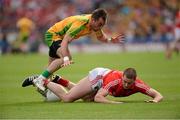 26 August 2012; Fintan Goold, Cork, is tackled by Karl Lacey, Donegal. GAA Football All-Ireland Senior Championship Semi-Final, Cork v Donegal, Croke Park, Dublin. Picture credit: Matt Browne / SPORTSFILE