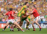 26 August 2012; Colm McFadden, Donegal, supported by LeoMcLoone, in action against Michael Shields, Patrick Kelly and Graham Canty, Cork. GAA Football All-Ireland Senior Championship Semi-Final, Cork v Donegal, Croke Park, Dublin. Picture credit: Oliver McVeigh / SPORTSFILE