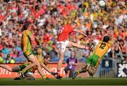 26 August 2012; Graham Canty, Cork, in action against Eamonn Magee, Anthony Thompson and Mark McHugh, Donegal. GAA Football All-Ireland Senior Championship Semi-Final, Cork v Donegal, Croke Park, Dublin. Picture credit: Oliver McVeigh / SPORTSFILE